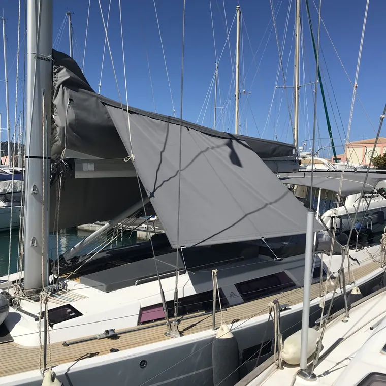 Lazy bag open along the boom with the mainsail flaked inside