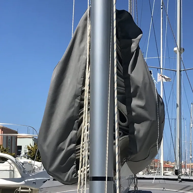 Lazy bag gathered at the mast, luff track and slides visible